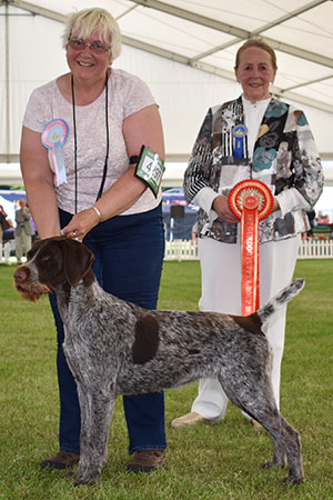 Miss S Pinkerton Bareve By The Book with puppy group judge Mrs M Purnell-Carpenter