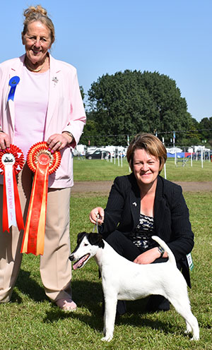 Mr J & Miss E Hannar Borovale Nameri with puppy group judge Mrs M Purnell-Carpenter