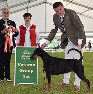 Mrs J A Ingram & Miss V L Ingram Ch Tronjheim Belladonna From Jojavik JW Sh CM with veteran group judge Mr S Band & royal Canin